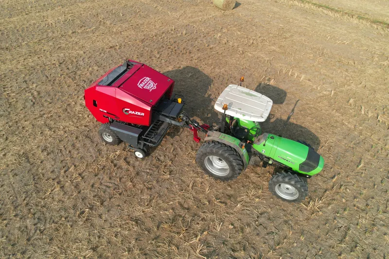 The FM1280 and tractor from a high three-quarter angle